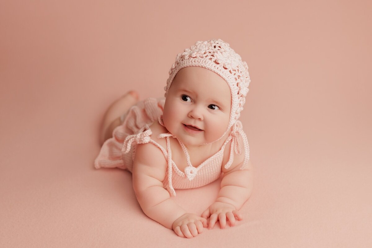 Perfect for babies around 6-9 months, our baby photography sessions highlight adorable smiles