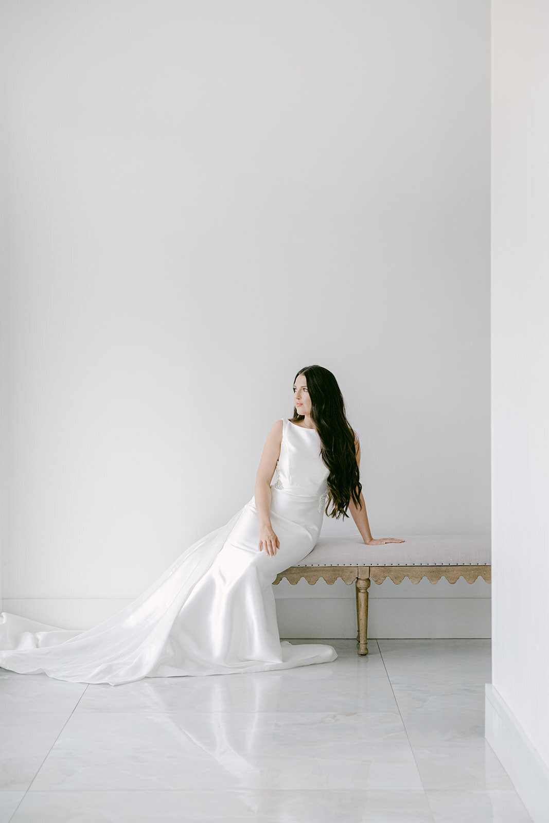 Bride walking softly across natural light-filled room at The Videre Estate, photographed by Austin wedding photographer.