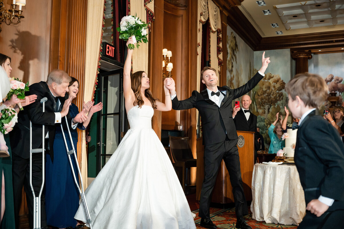 duquesne club pittsburgh wedding reception entrance of bride and groom