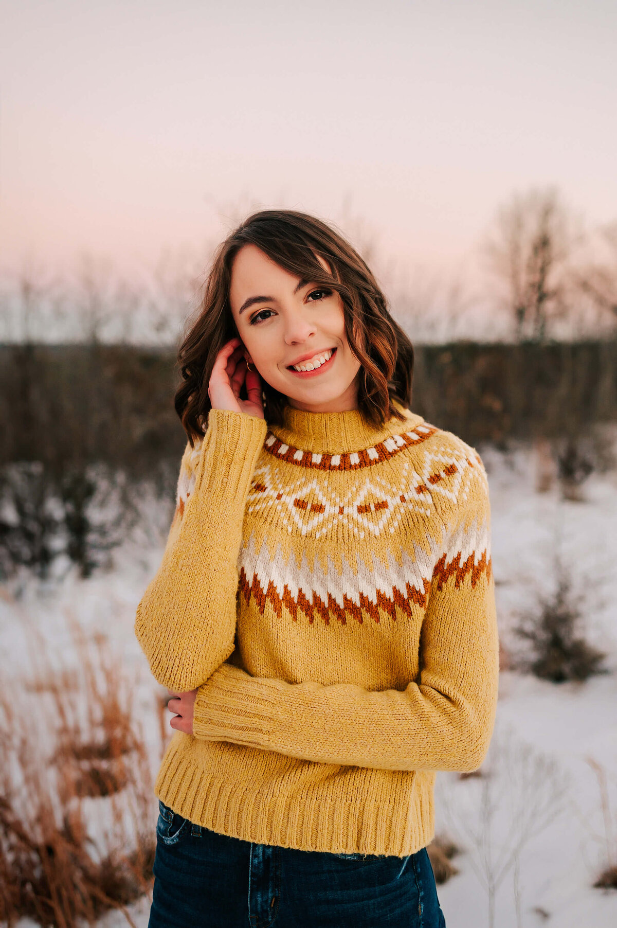 Branson Missouri senior photographer Jessica Kennedy of The XO Photography of senior girl smiling in the snow at sunset