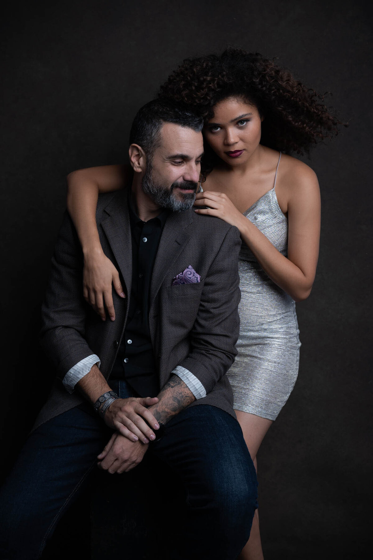 a couple posing to the camera