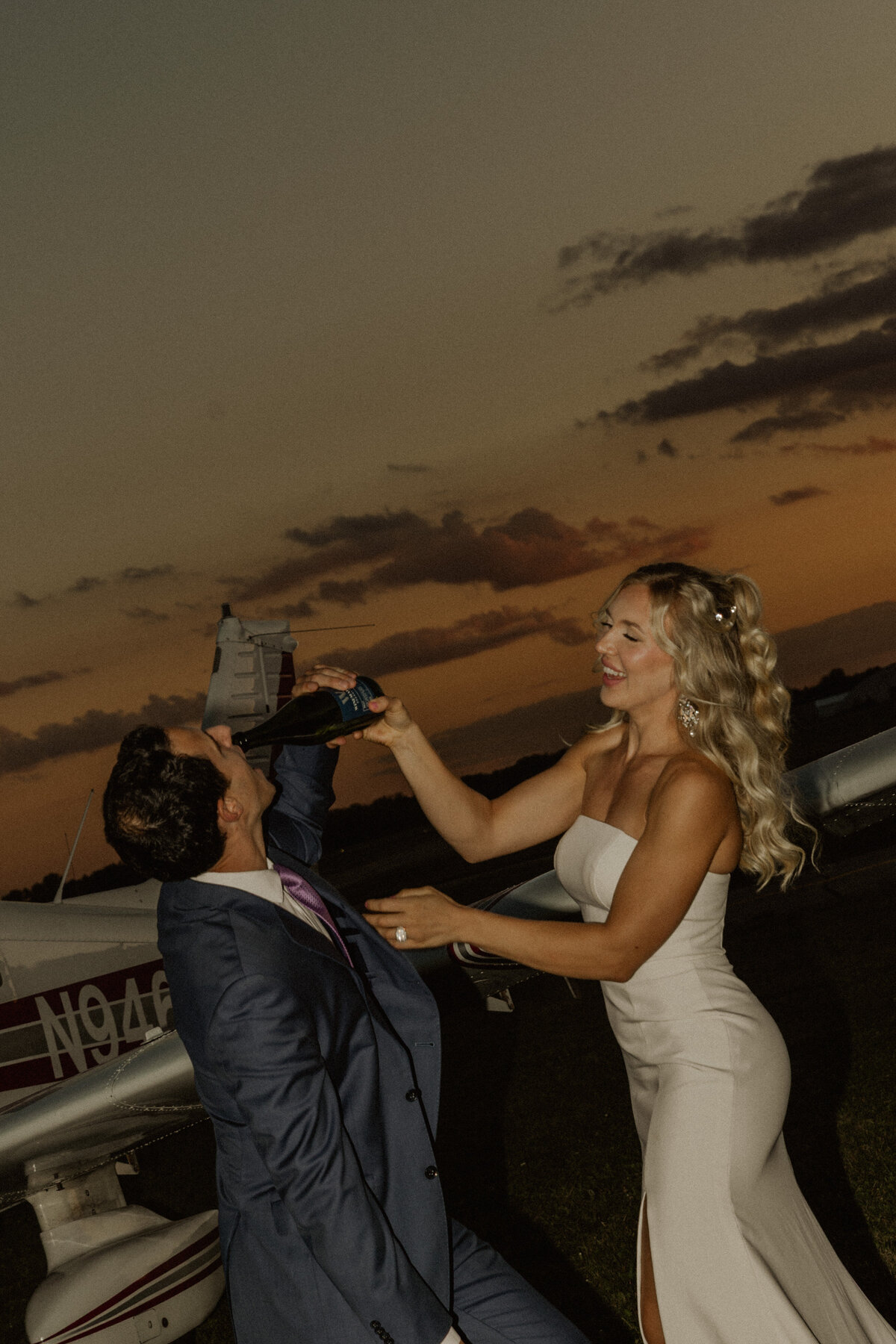 Sunset Champagne Pop for a Plane Themed Elopement in Florida 