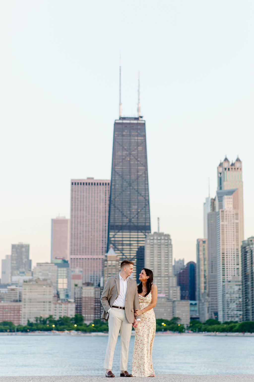 An engagement photography session at The Wrigley Building and North Ave Beach in Chicago, Illinois - 24