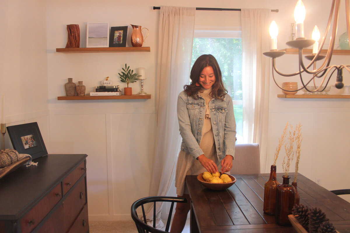 Amy staging the dining room