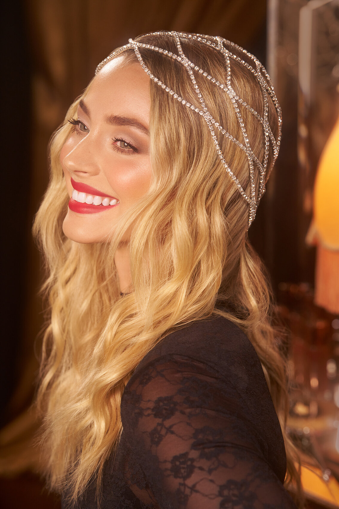 Saige Peterson with radiant makeup and hairstyle for the Charlotte Tilbury campaign, exuding luxury and elegance, by Ylva Erevall.