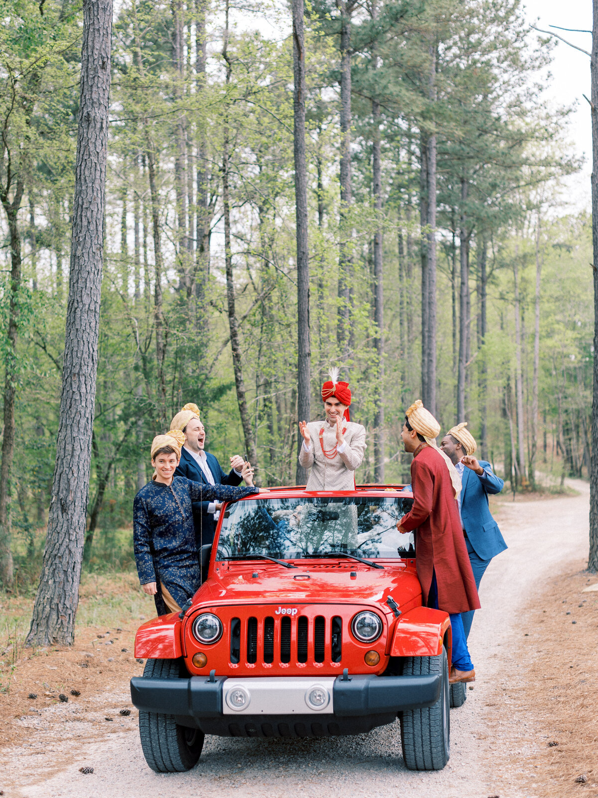 Prianka + Alex - Hindu Wedding 6 - Baraat - Groom entering in a Red jeep