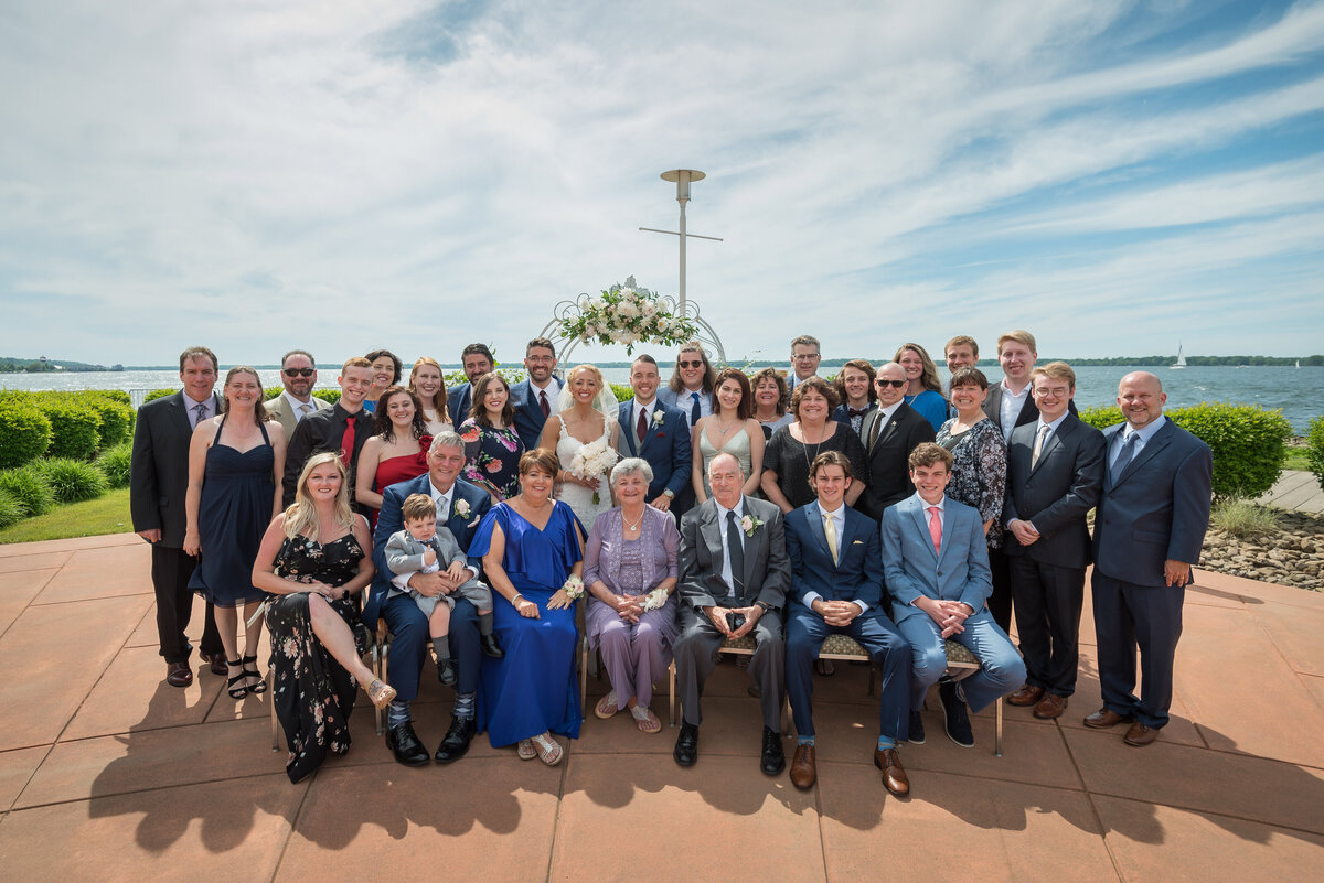 Family group photo during outdoor wedding at the Bayfront Convention Center.