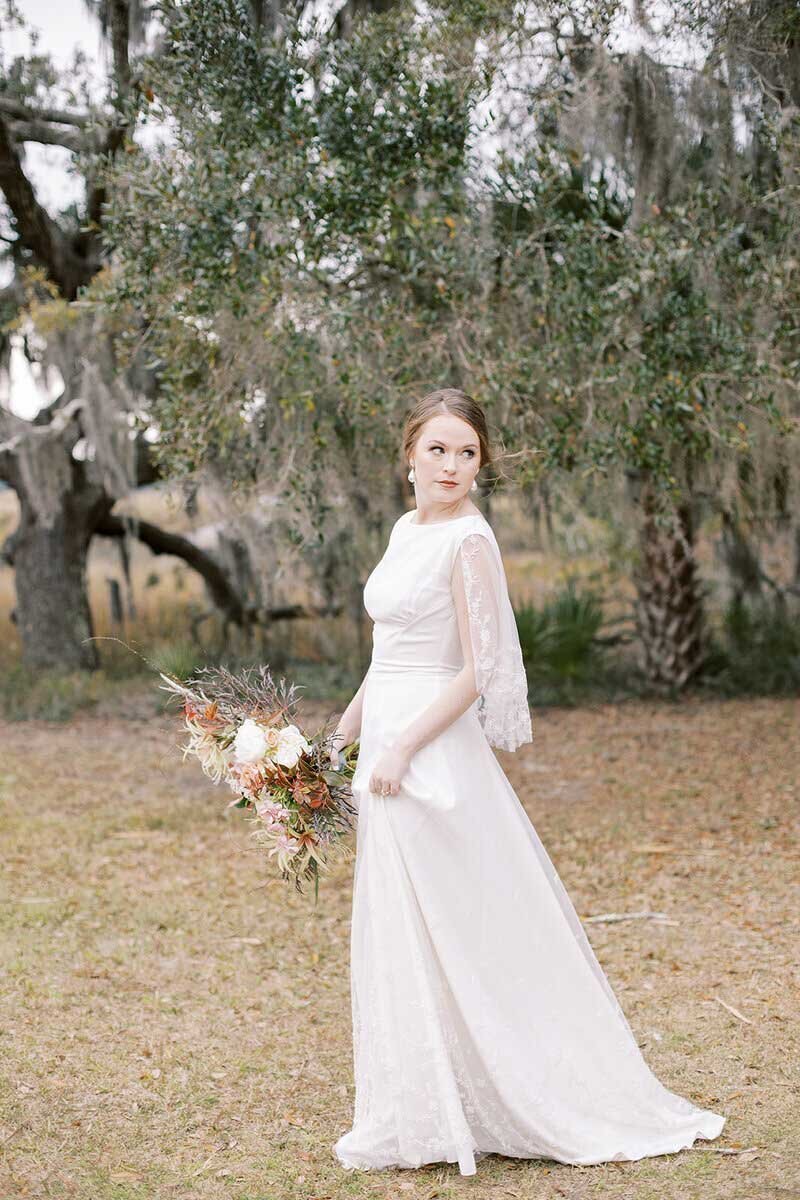 modern slim-a-line wedding dress with detachable bridal cape