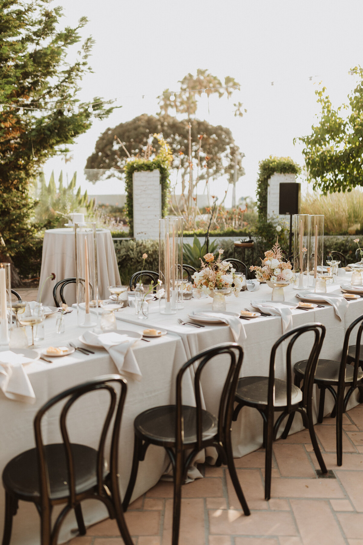 Neutral Wedding Table scape with black chairs