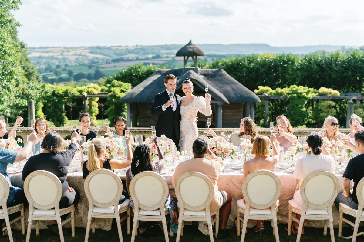 Toasts at a wedding reception at the Boathouse at Euridge Manor