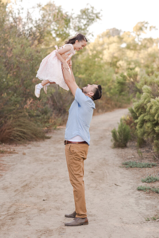 father-tossing-up-daughter-Bonita-San-Diego