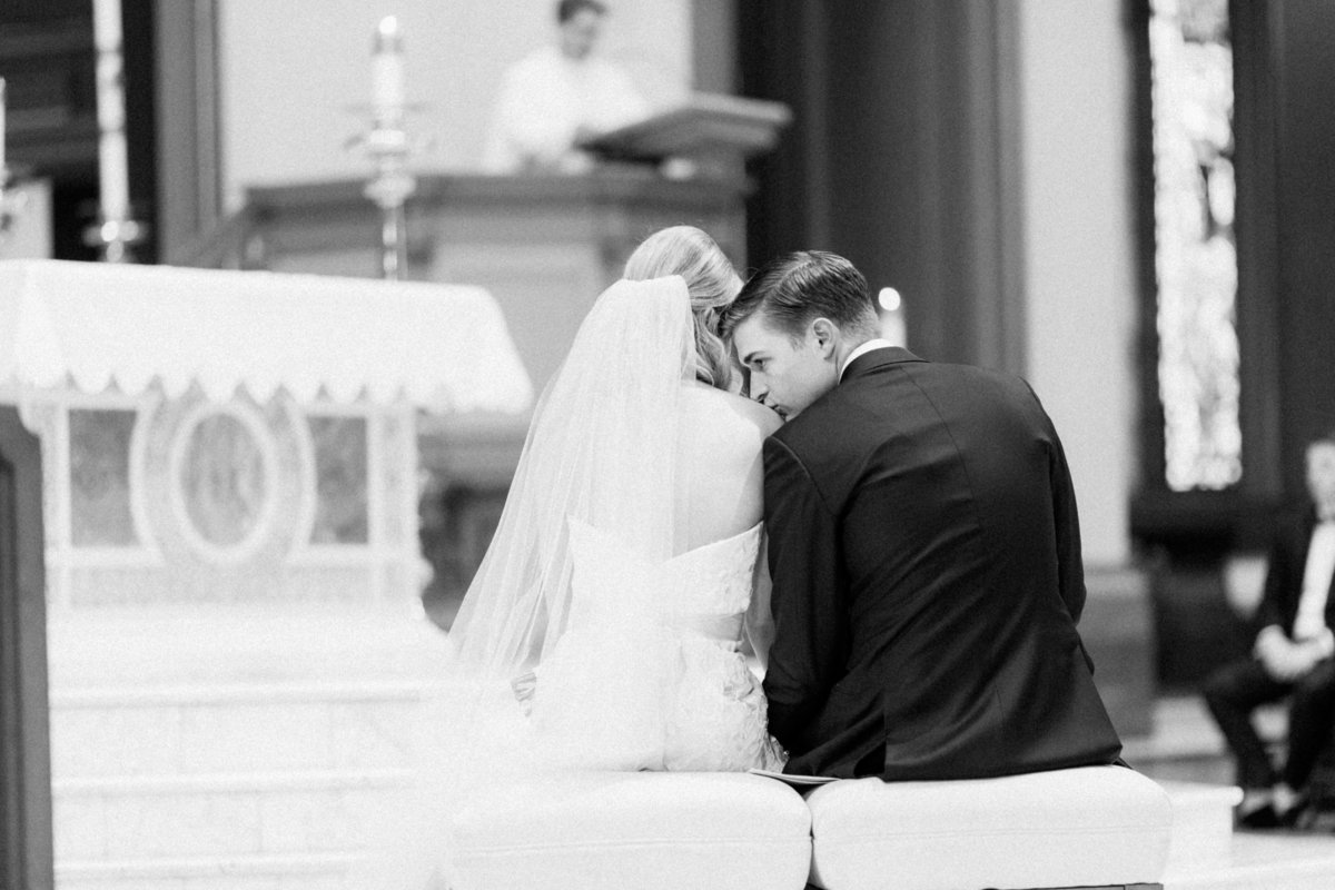30_ceremony_candid_kiss_cathedral_of_the_sacred_heart_richmond_wedding