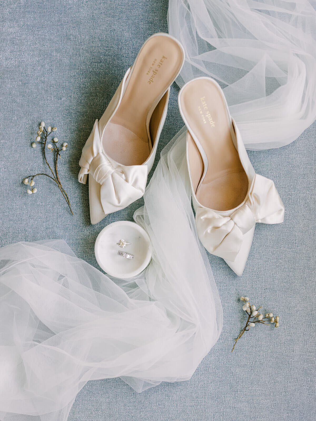Bride's shoes and jewelry before the ceremony