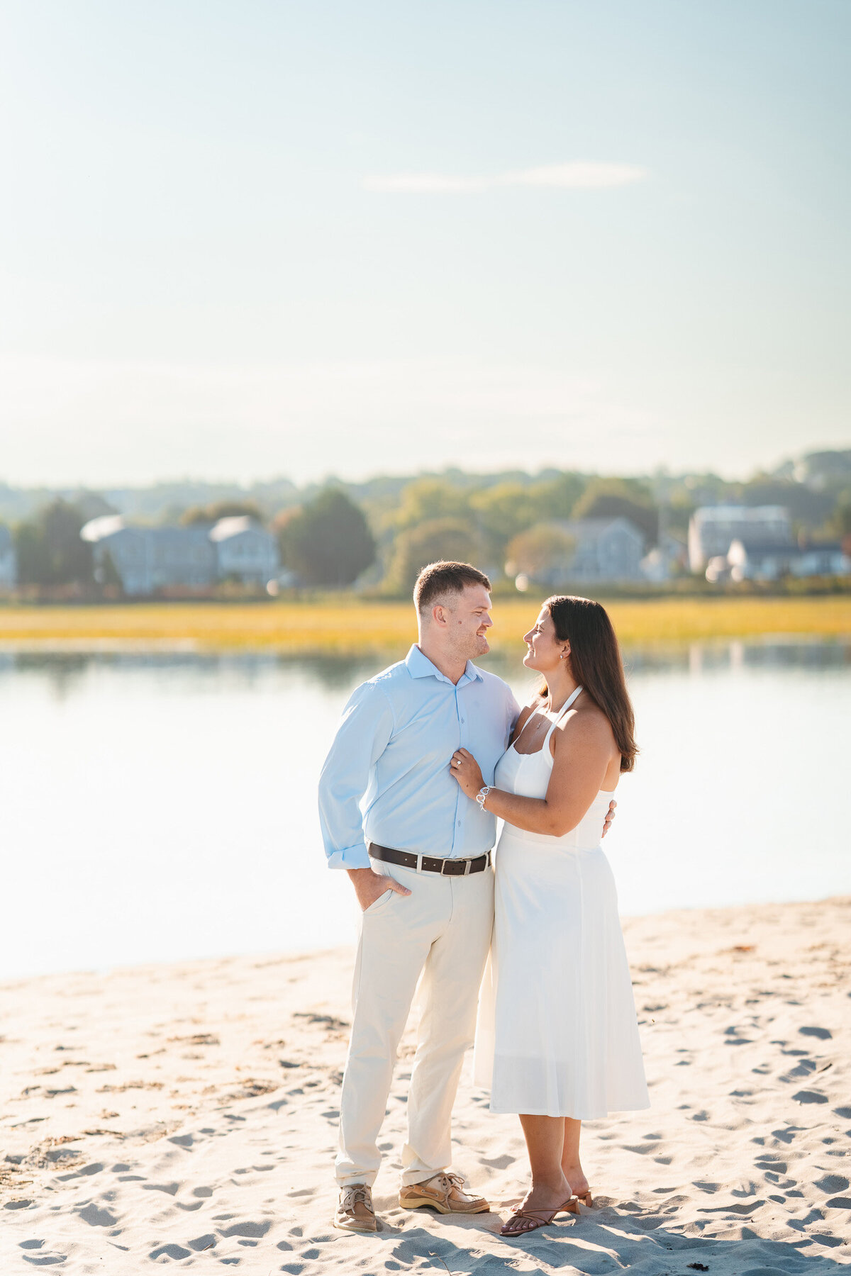 Massachusetts coastal engagement photographer capturing emotional portraits at Good Harbor Beach.