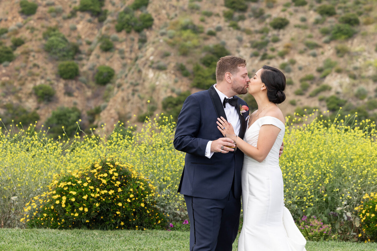 Bride and groom kissing