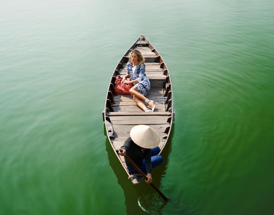 Image of woman in boat in Vietnam