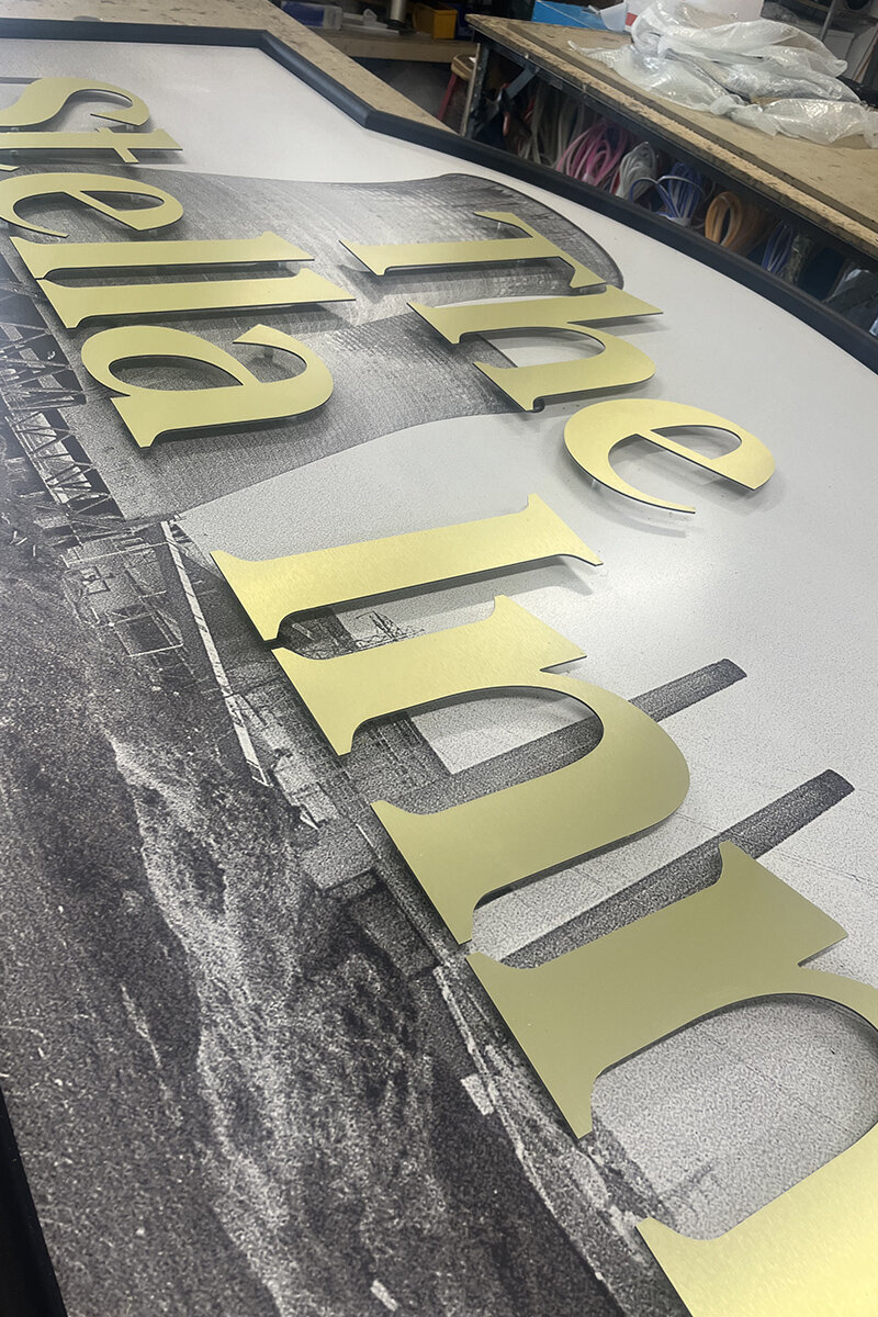 ellis-signs-gold-acm-letters-fixed-to-printed-panel-newcastle-gateshead-north-east