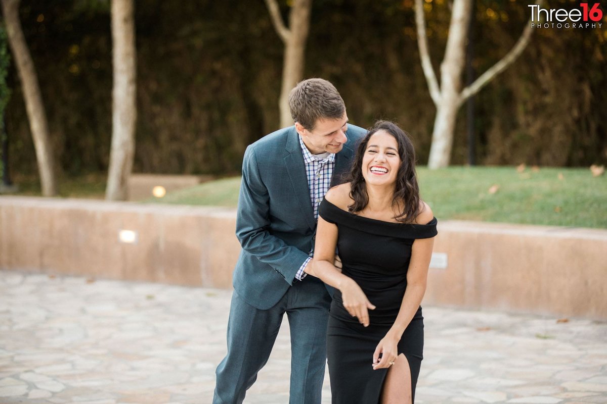 Groom to be makes his fiance laugh