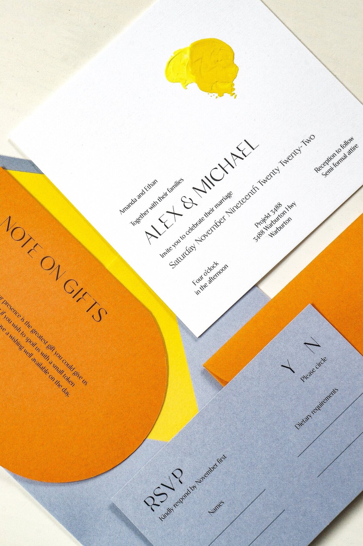 Bright-yellow-and-orange-wedding-invitations