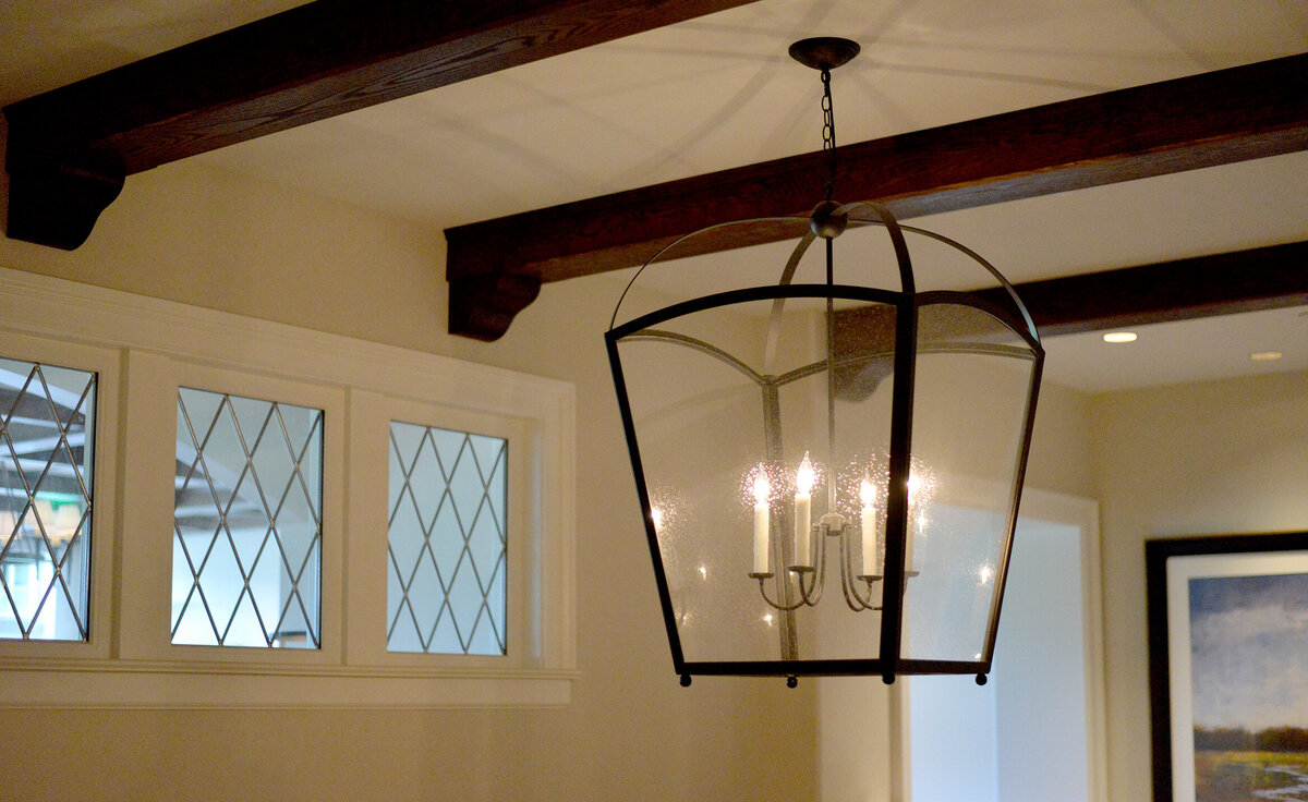 interior windows and chandelier over the stair at Fox Chapel Golf Club