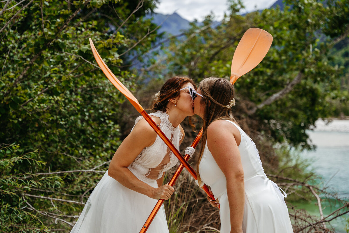 Brides paddling Soča Valley river elopement