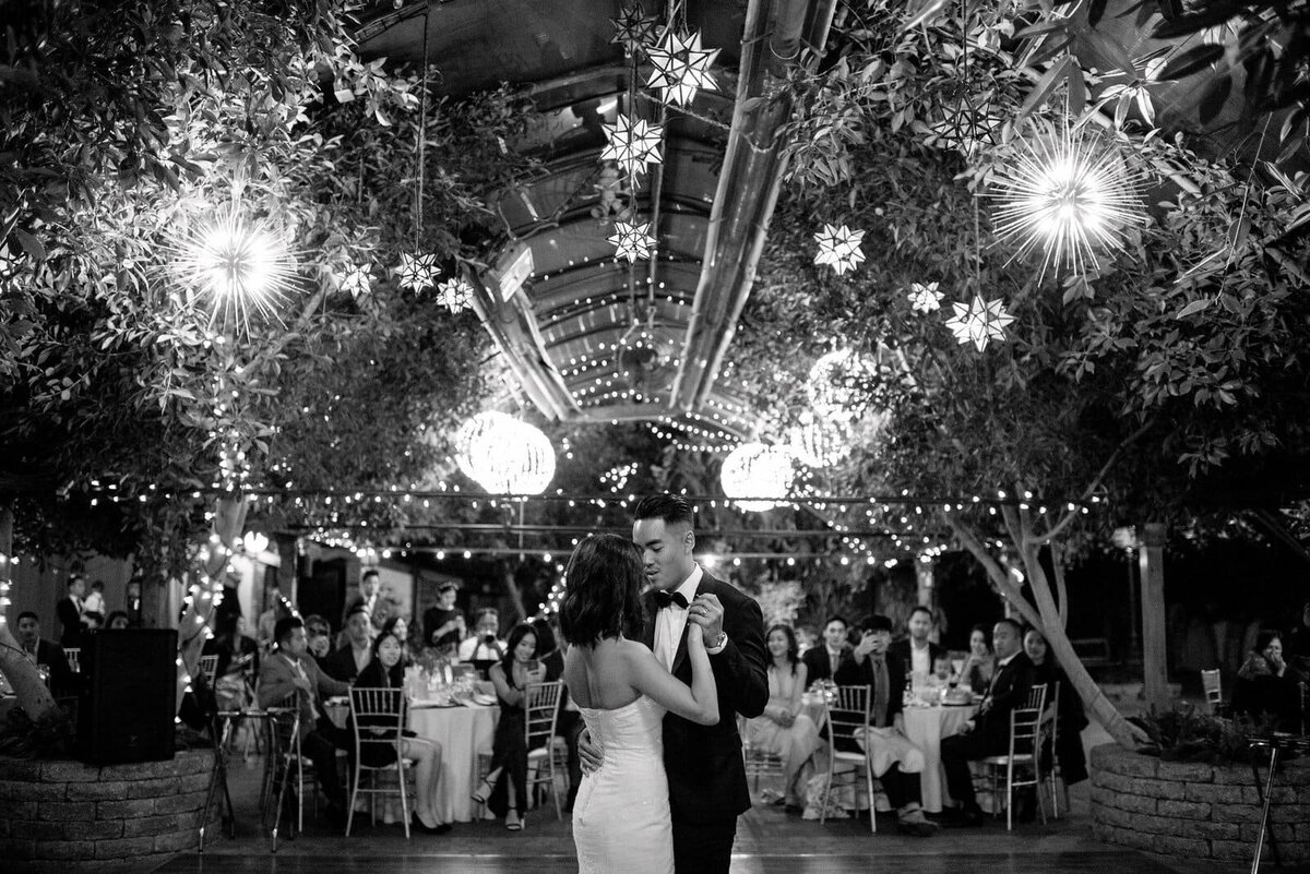 first dance whimsical reception twinkle lights  madison greenhouse wedding newmarket jacqueline james photography