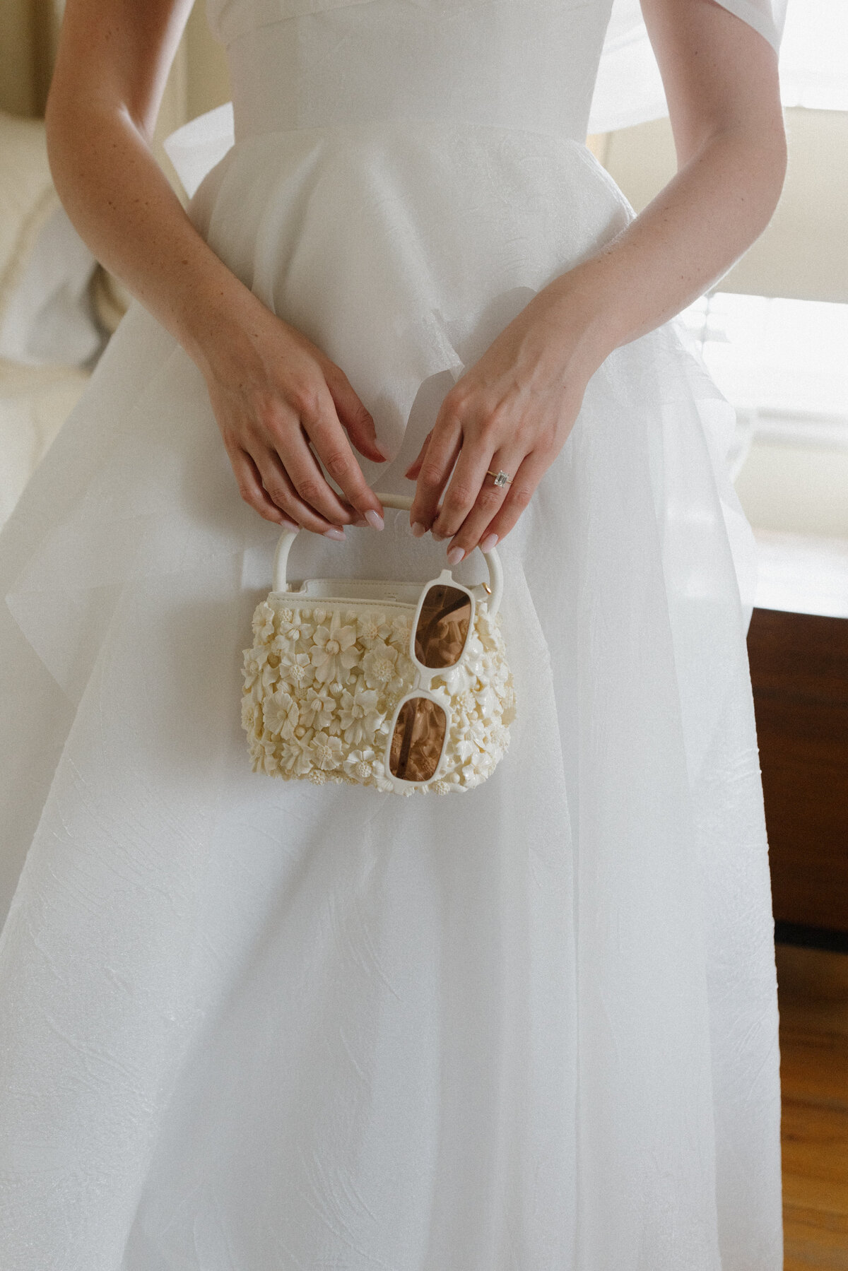 Sophisticated bridal portrait showcasing editorial fashion photography techniques at Lion Rock Farm. NYC photographer Lauren Alatriste creates luxury wedding imagery that feels both fashion forward and authentically emotional, capturing the bride's natural grace against the venue's rustic elegance in this Connecticut destination wedding.