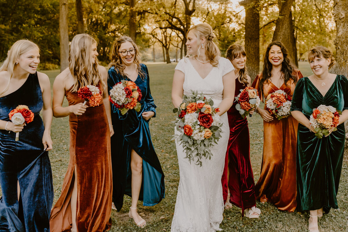 storyteller-collective-photo-co-bride-bridesmaids-laughing-walnut-woods-state-park-west-des-moines-iowa