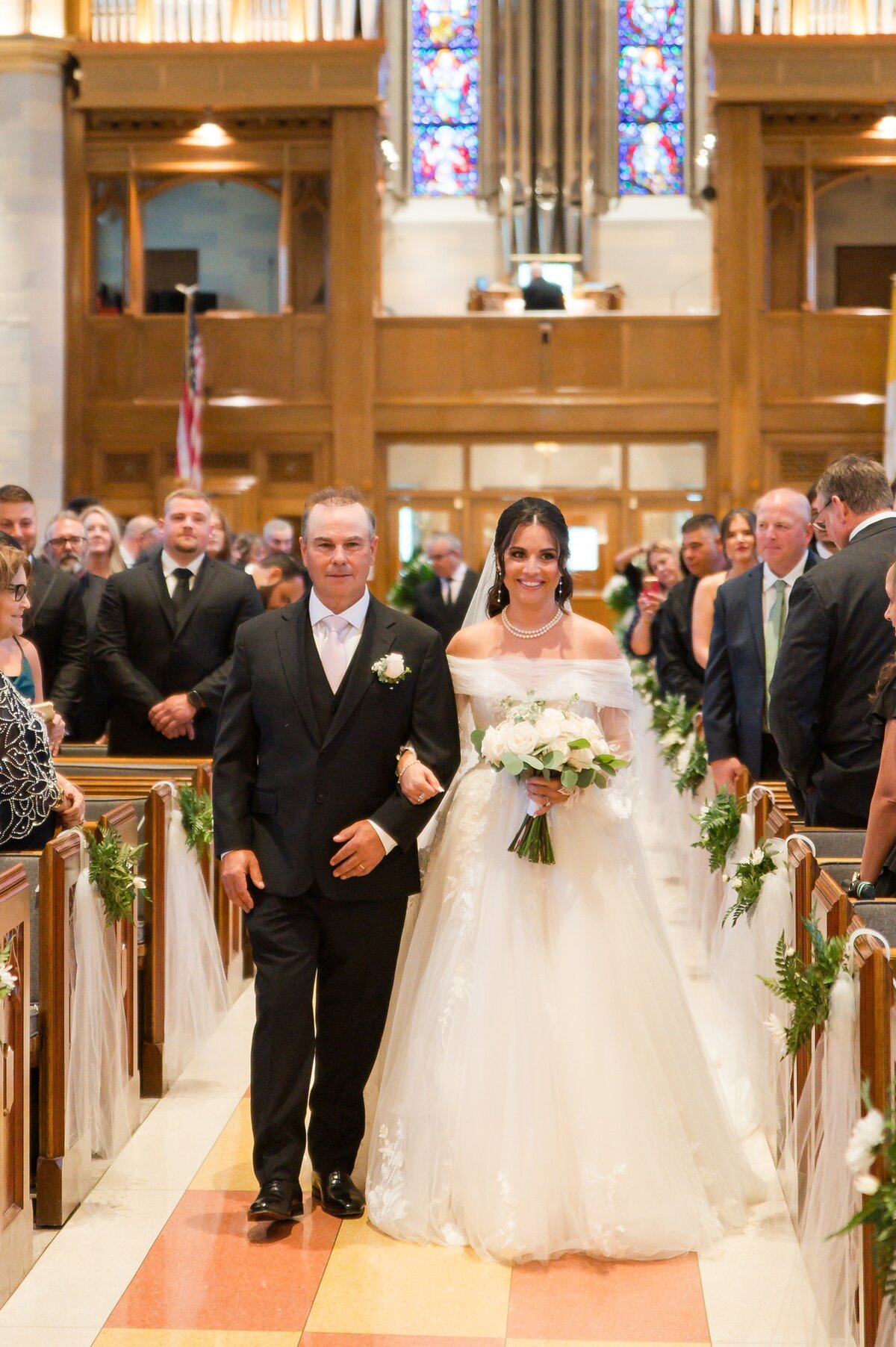 bride walking down the aisle at st anns