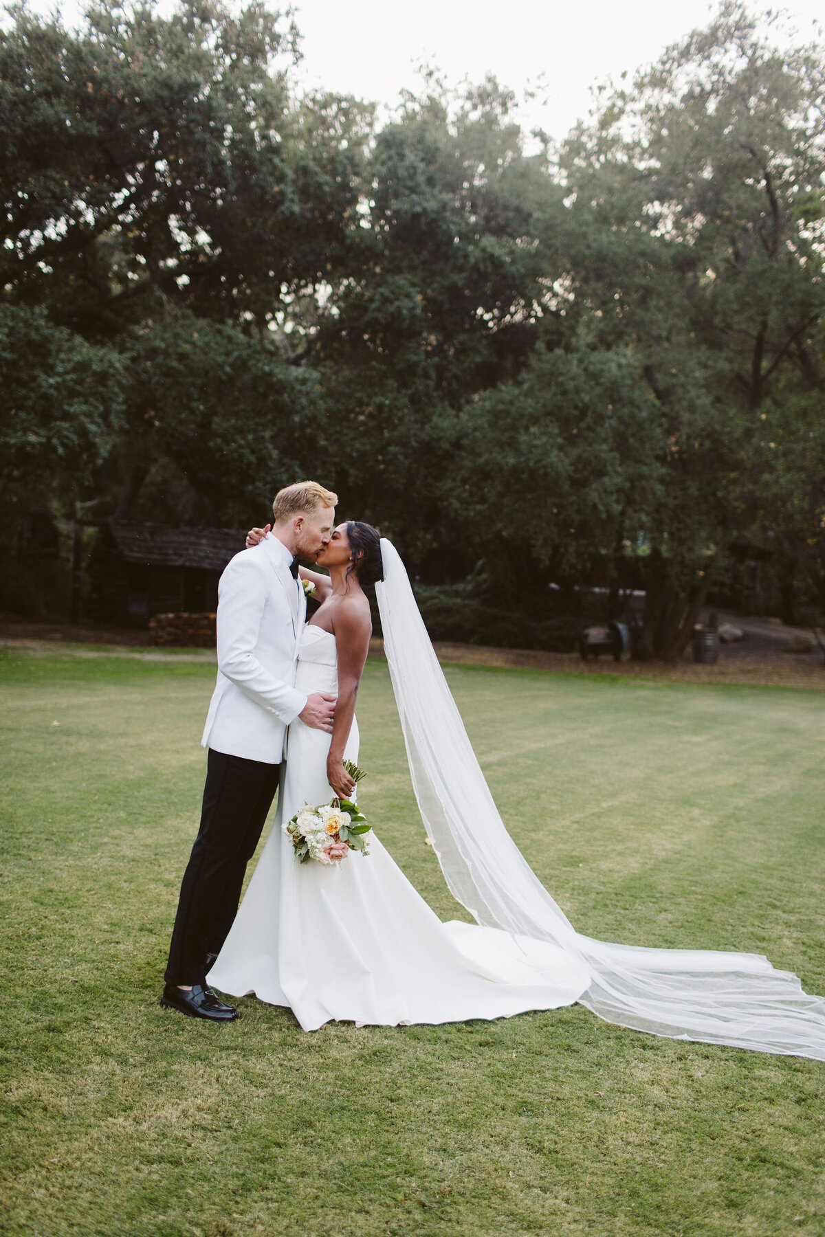 Interracial wedding couple at Calamigos Ranch 