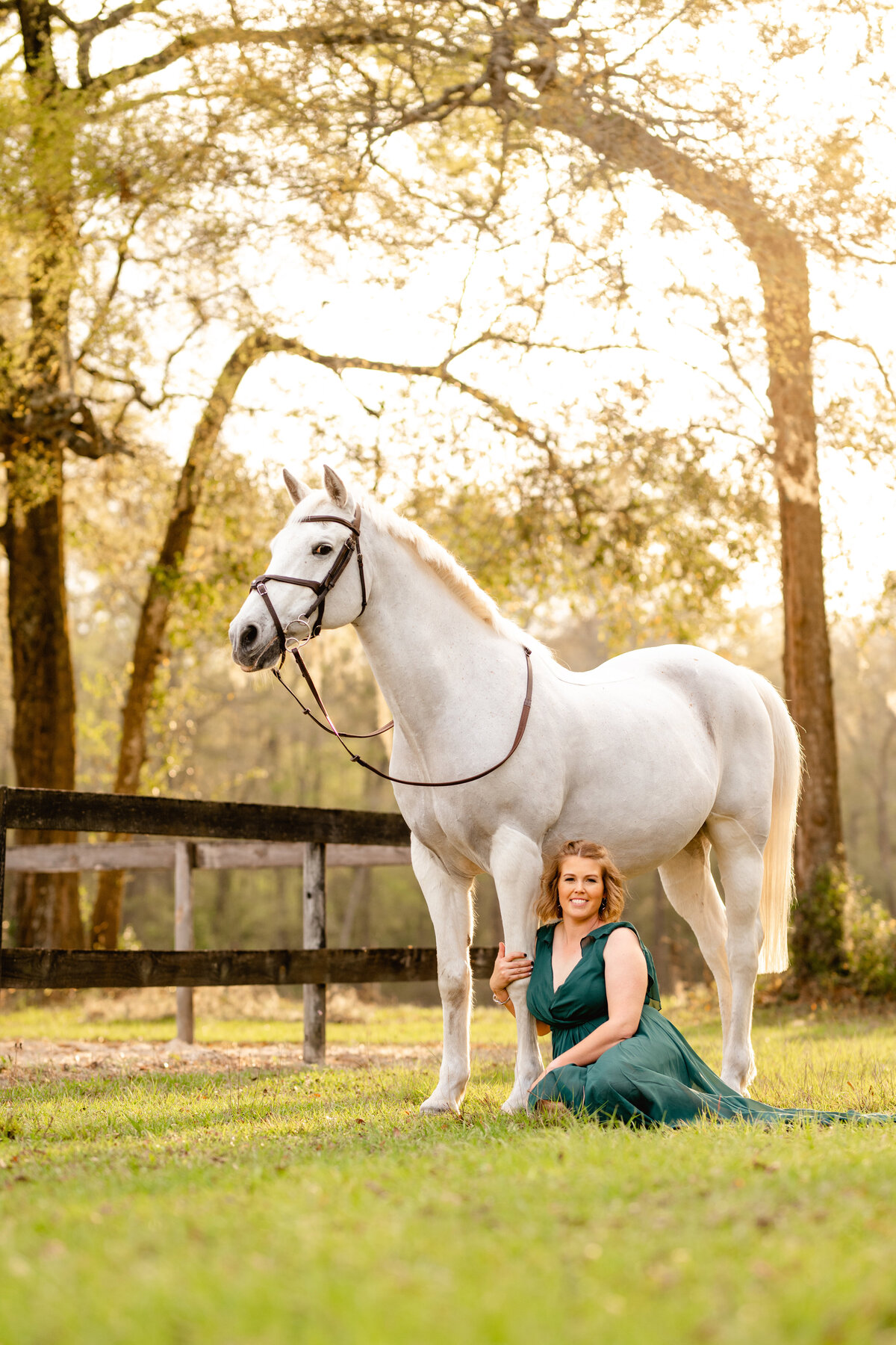 Florida horse photographer takes photos of girl with her grey eventing horse in Newberry, Florida.