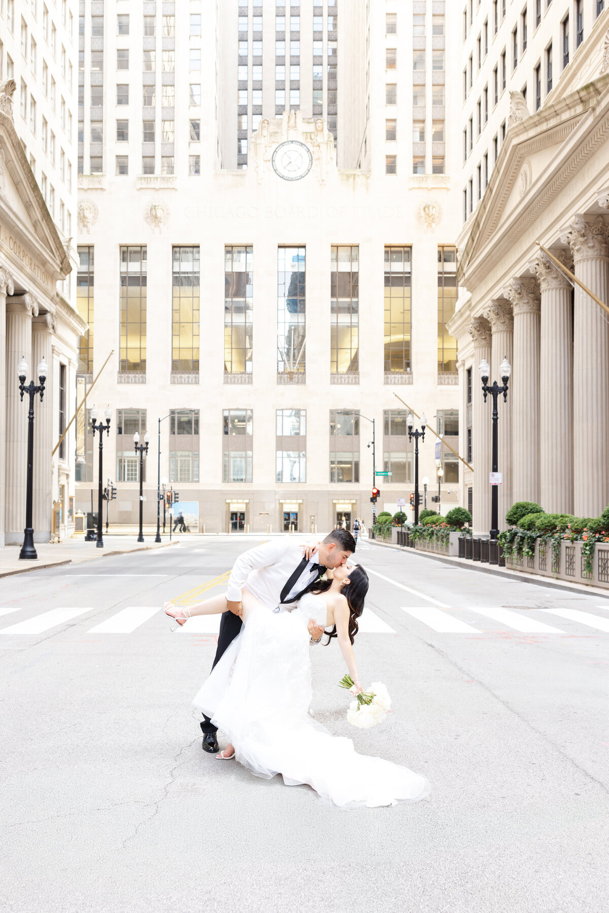 Romantic wedding portrait of bride and groom by The Board Of Trade in Chicago