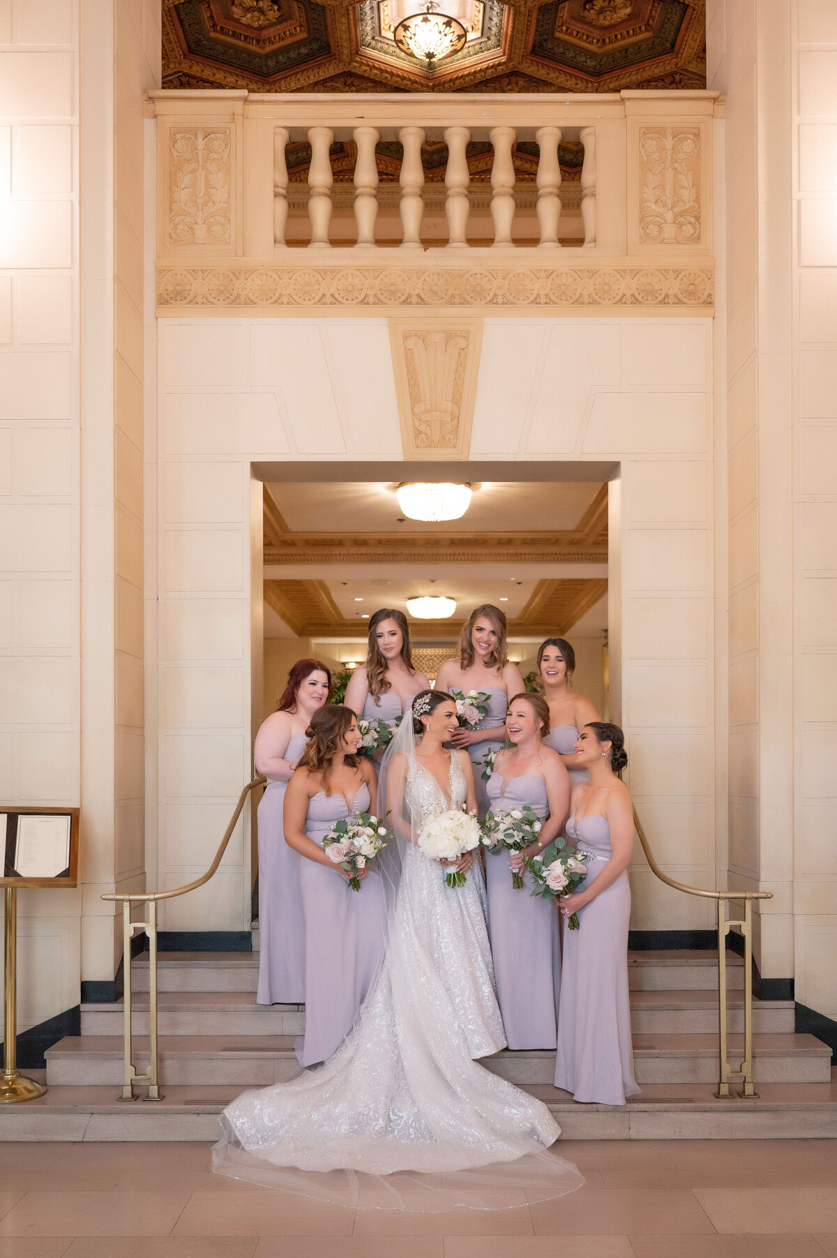 bride and her bridesmaids on the grant street entrance
