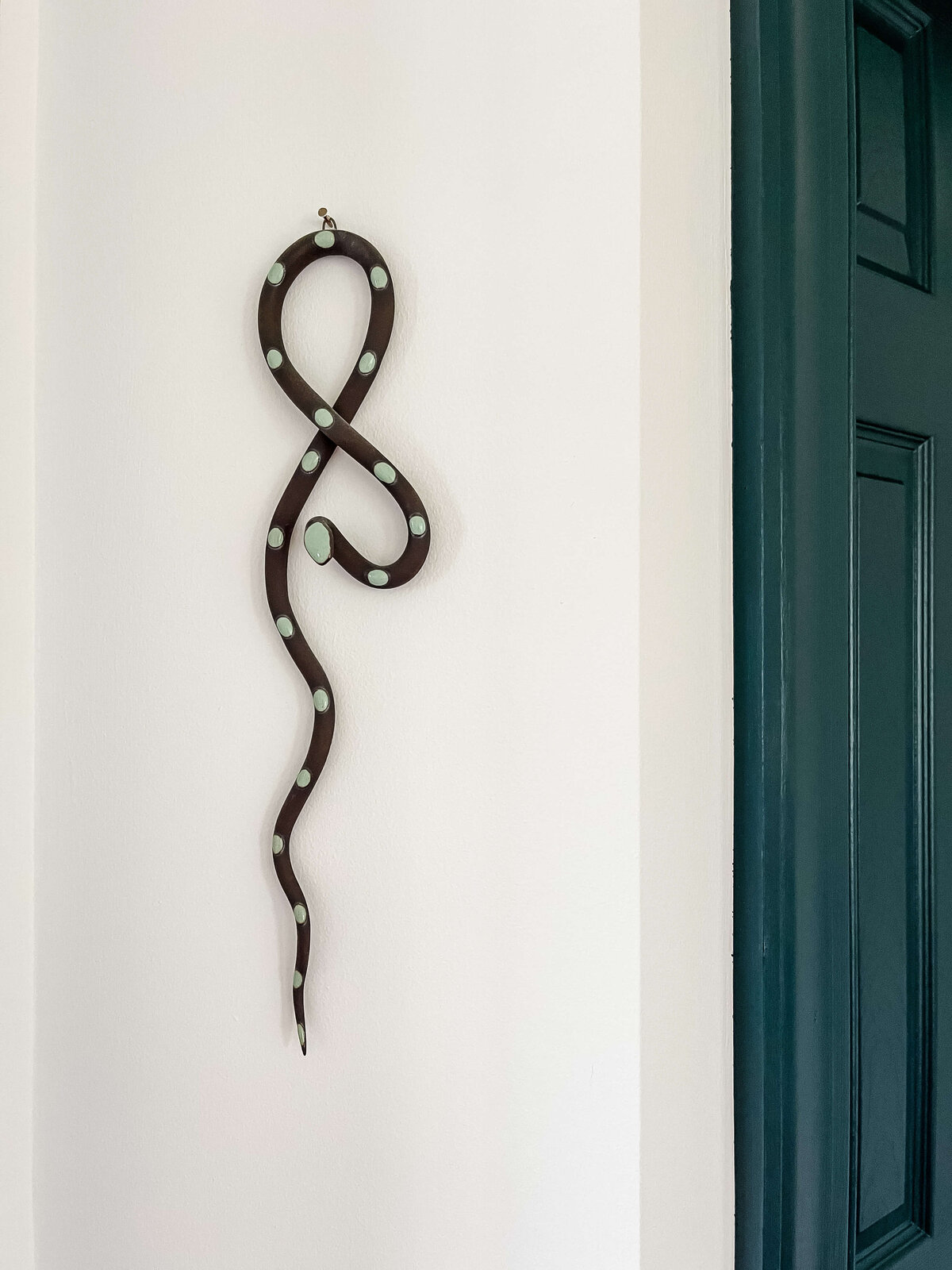 snake-sculpture-on-wall