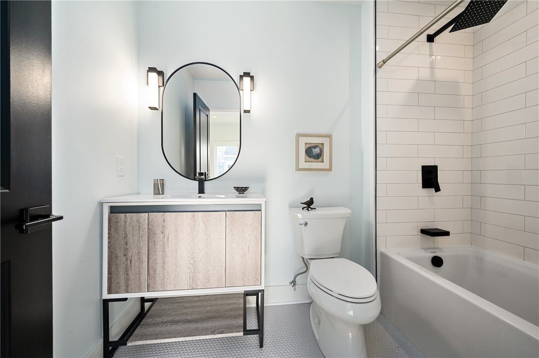 Bright and inviting staged bathroom showcasing functional design for quick home sale