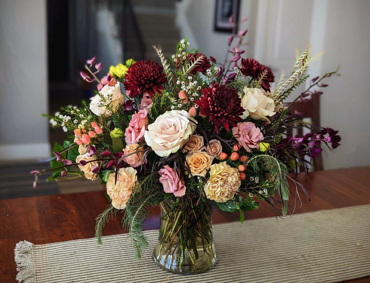 funeral arrangement vase pink red
