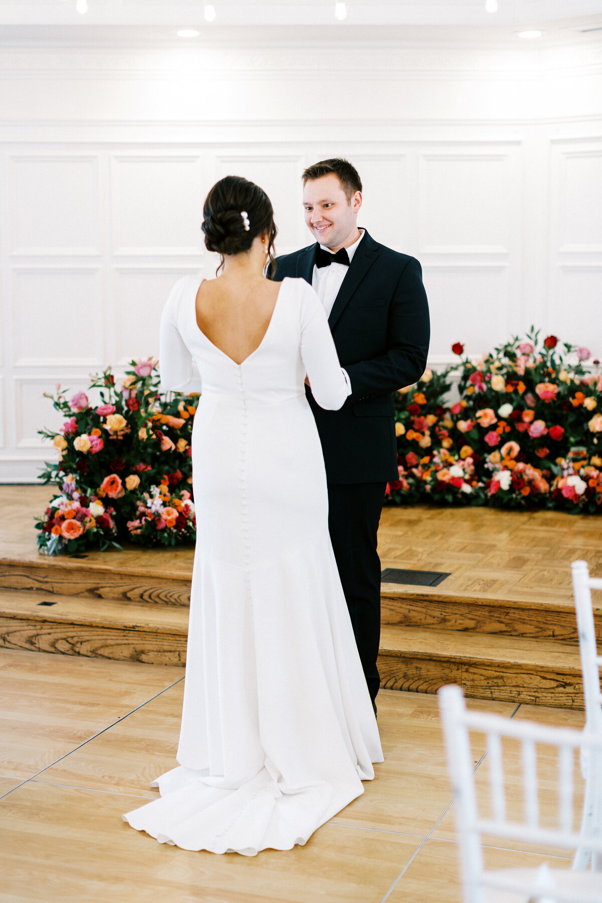 groom is looking at the bride in awe