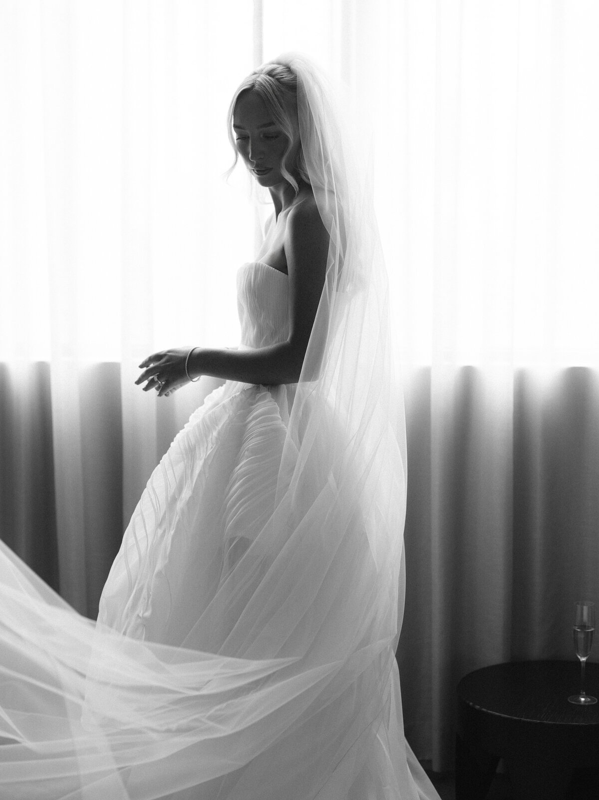 Fashion forward editorial wedding photography captures luxury bridal preparation at NOBU Hotel Chicago, showcasing Lauren Alatriste's signature approach combining sophisticated editorial aesthetics with authentic wedding day emotion.