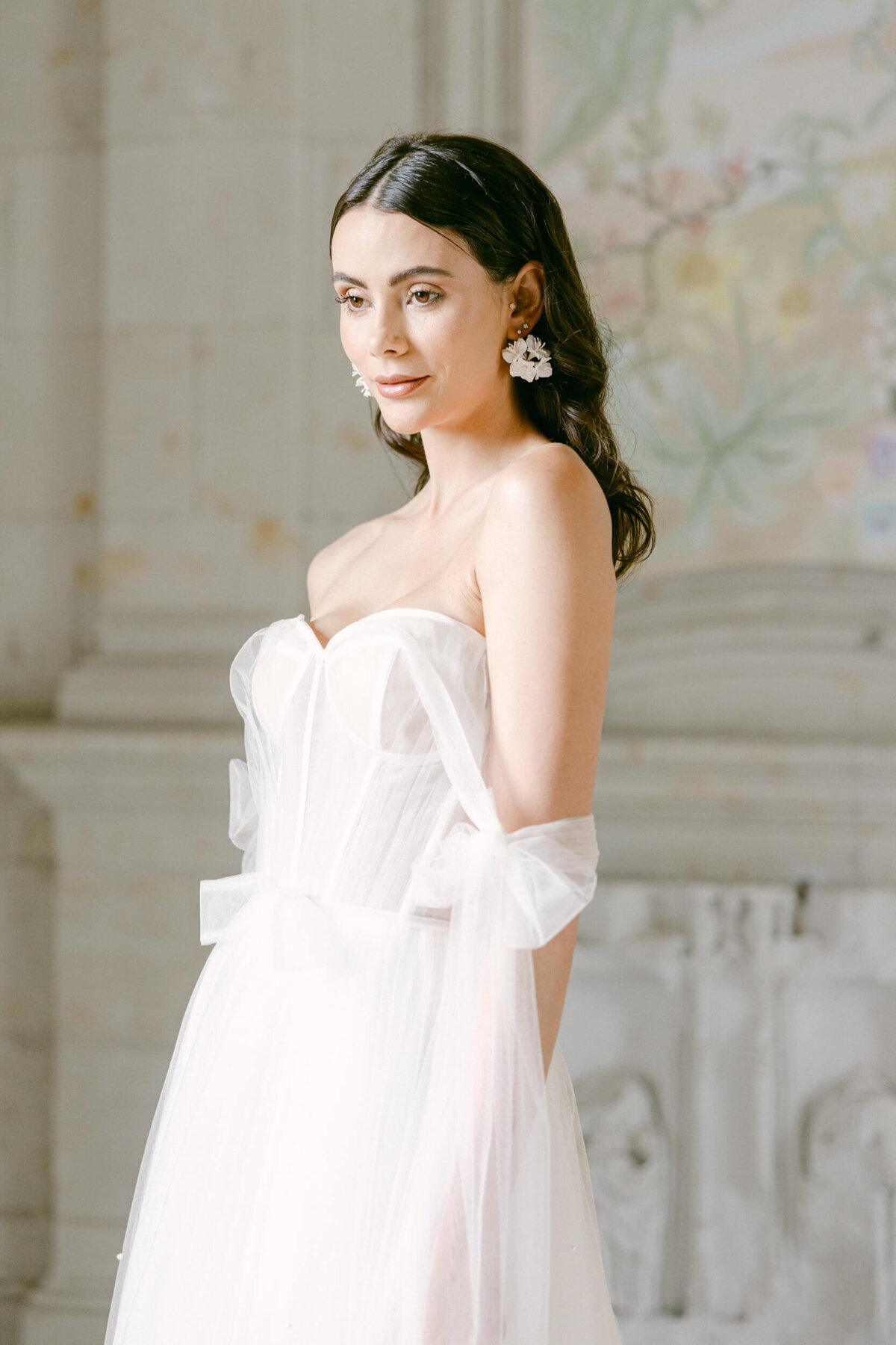 A wedding day photo of a bride in her white wedding dress at Chateau de Jalesnes in France