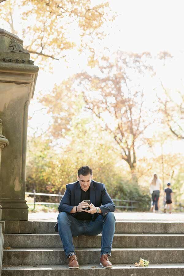 Man waiting in New York Central Park to propose to girlfriend