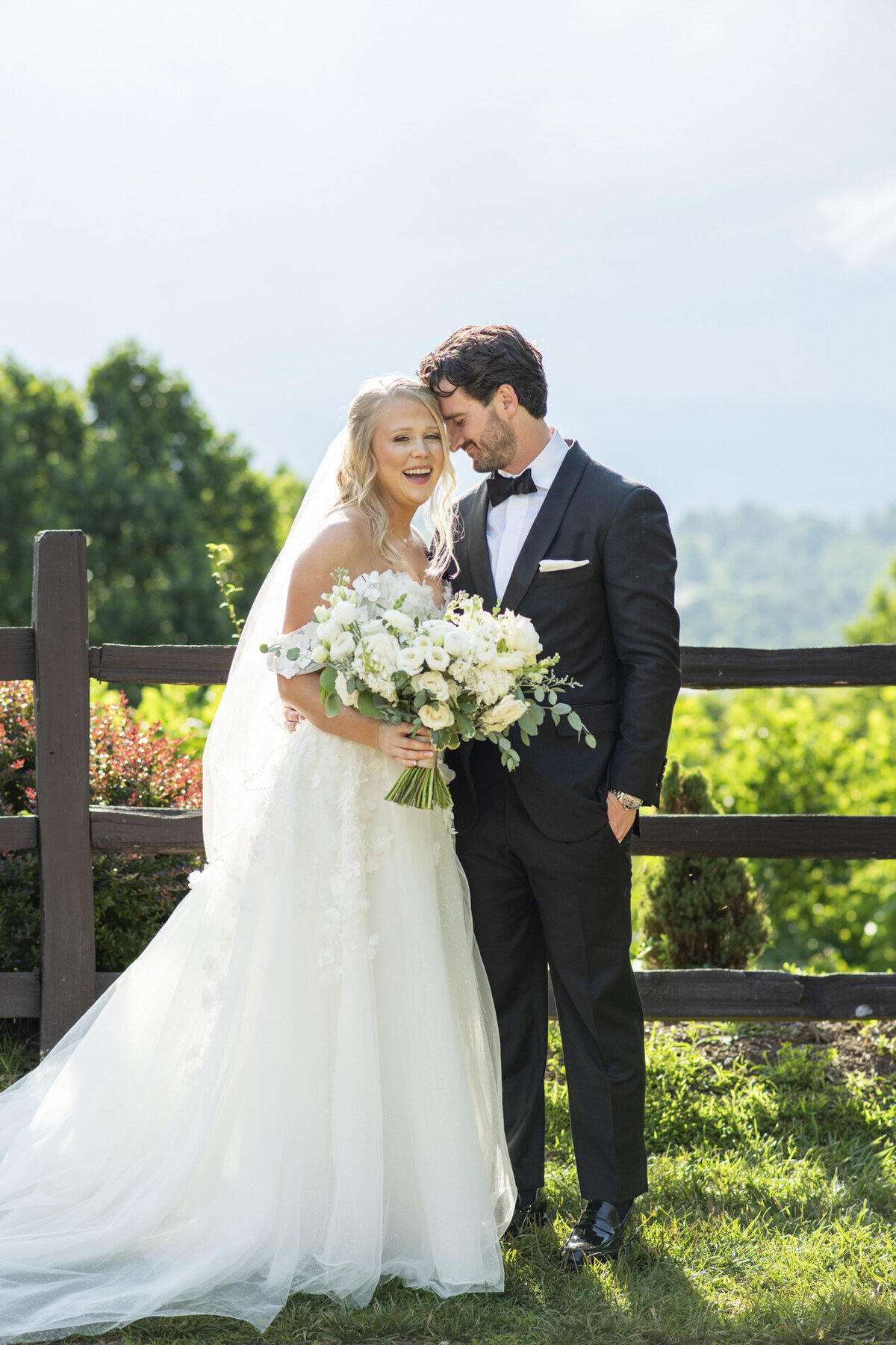 Couple laughing at wedding at Crest Pavilion Asheville