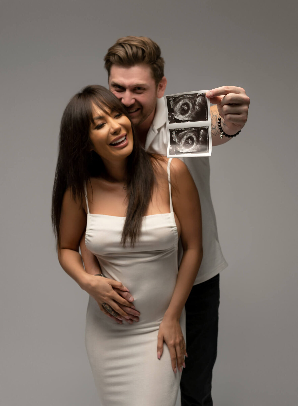 modern pregnancy announcement photo with ultrasound in Austin studio