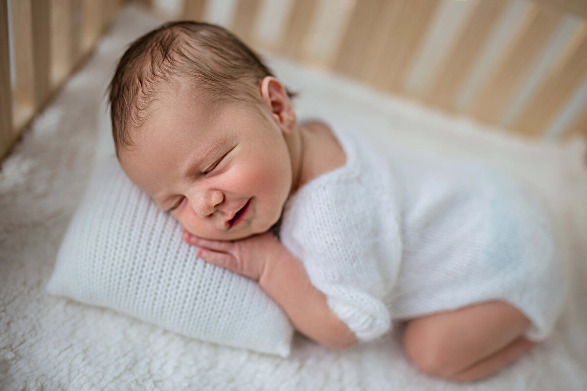 smiling-newborn-in-neutral-tones
