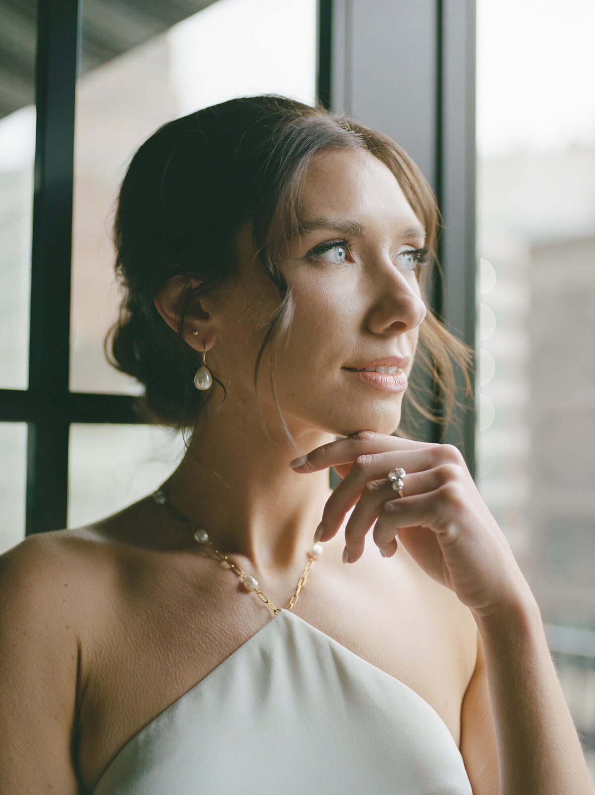 detail of bride jewelry, pearl wedding dress detail, pearl earrings, antique three stone diamond engagement ring