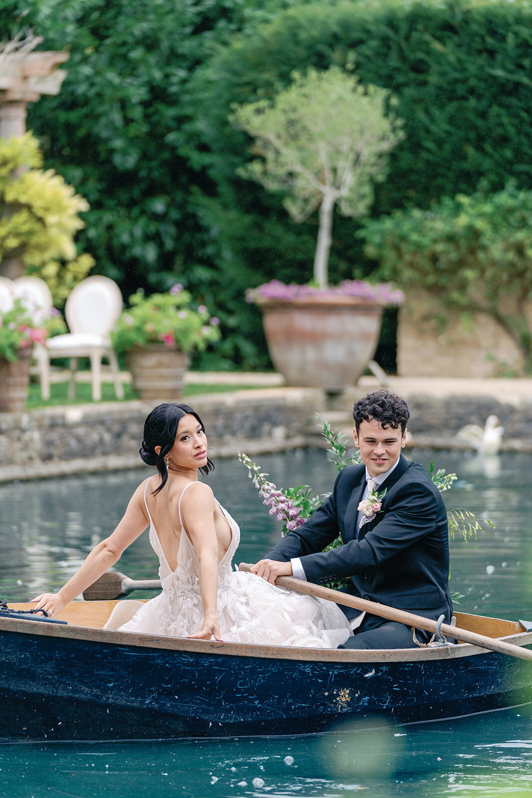 Bride and groom on the lake at Euridge Manor