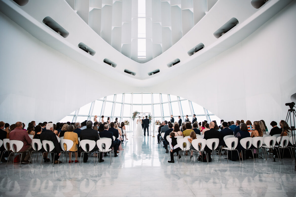A view of a wedding ceremony taking place at the Milwaukee Art Museum