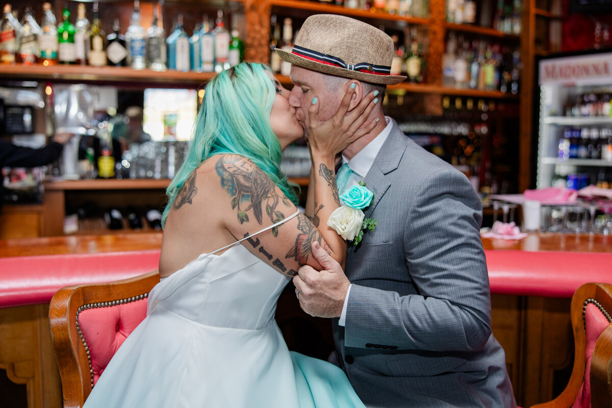 groom strokes brides arm