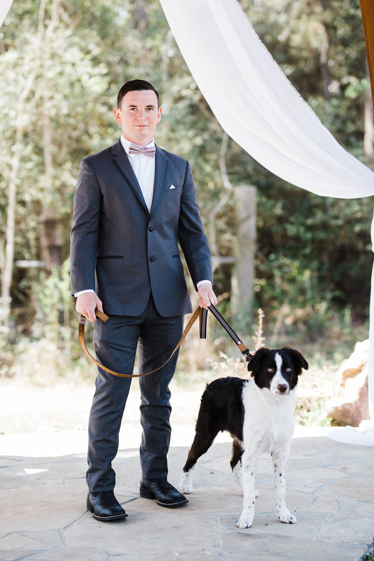 Groom with Pup at Wedding Venue