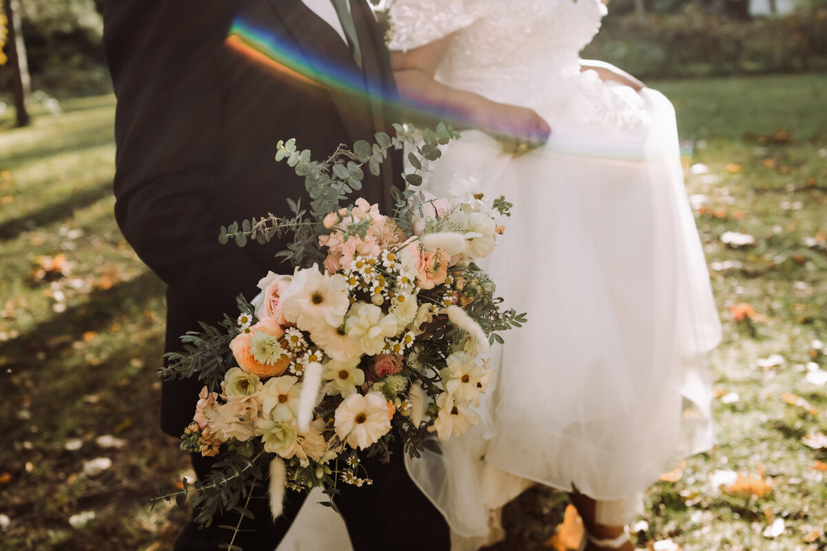 bride walking with groom outdoors