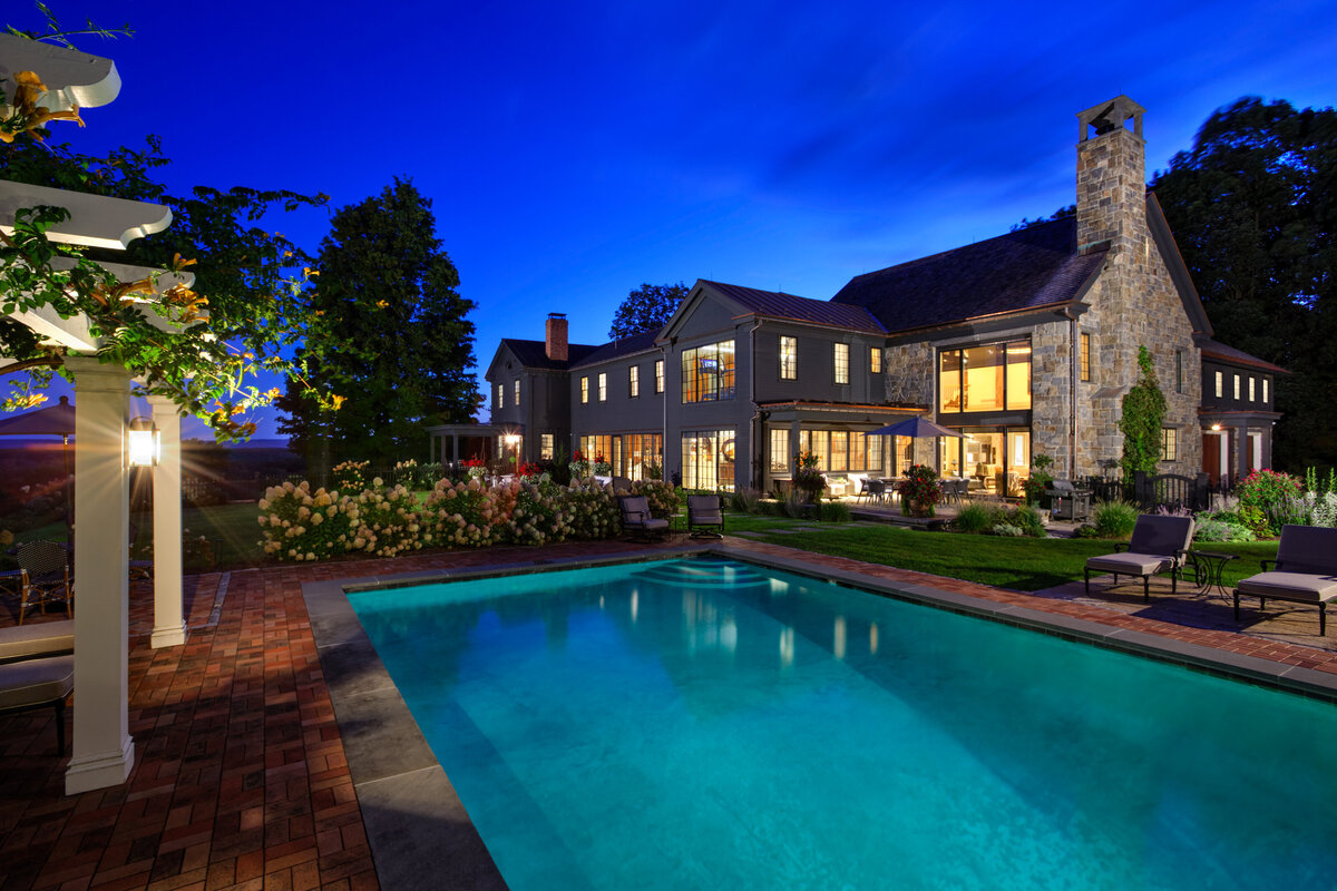 large pool overlooking house